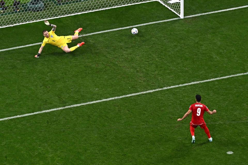 Taremi scores his and Iran’s second from the penalty spot (AFP/Getty)