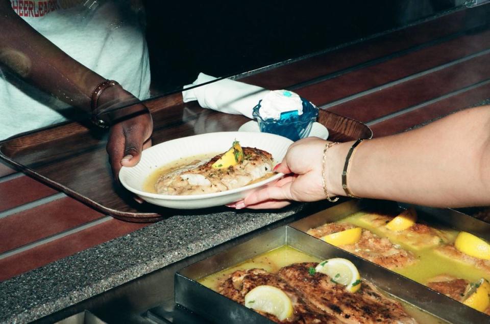 Serving up a blue plate special at the Picadilly Cafeteria. Miami Herald File