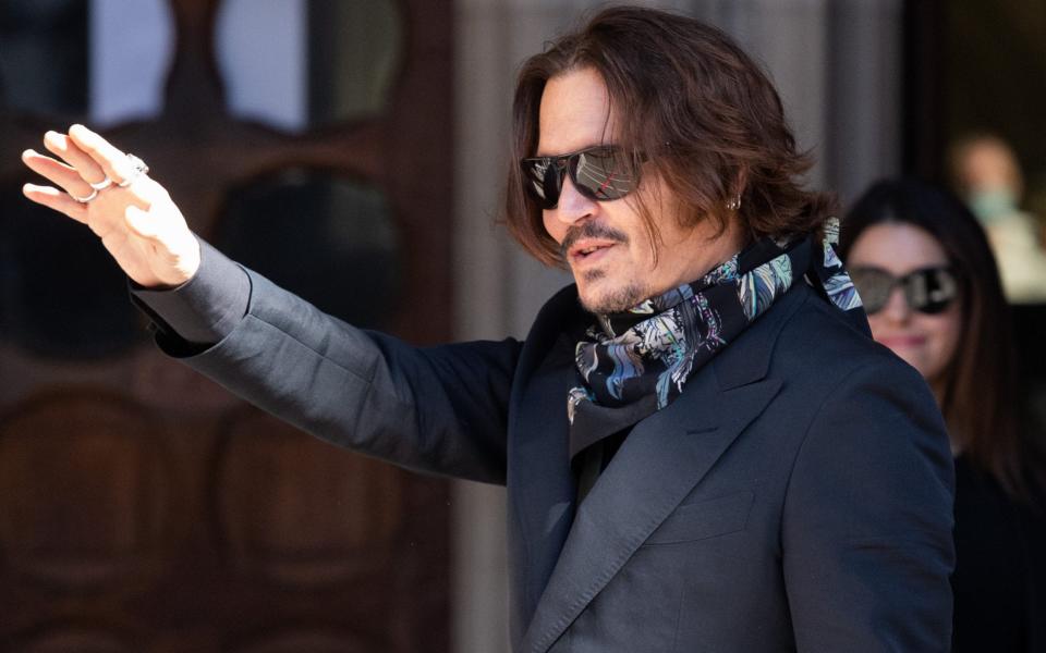 Depp greeting fans - Samir Hussein/WireImage