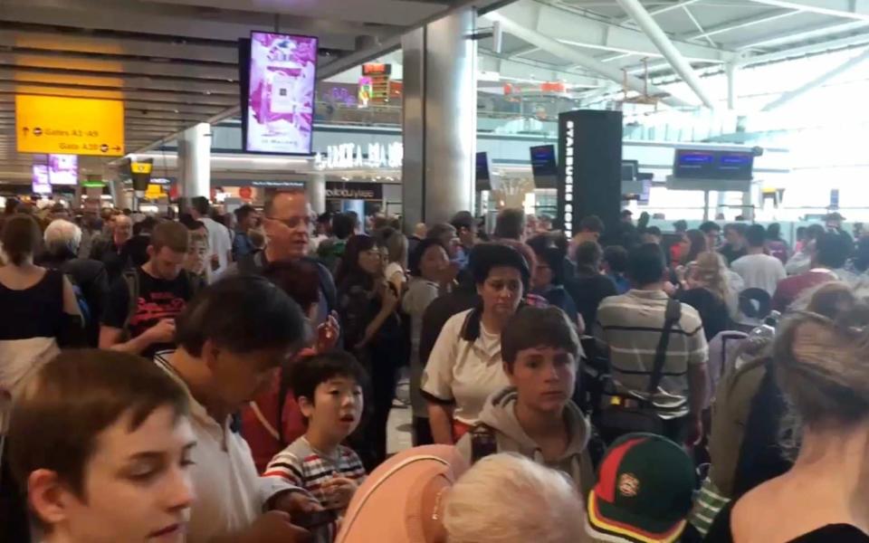 Passengers at Heathrow Terminal 5 - Credit: Emily Wilson