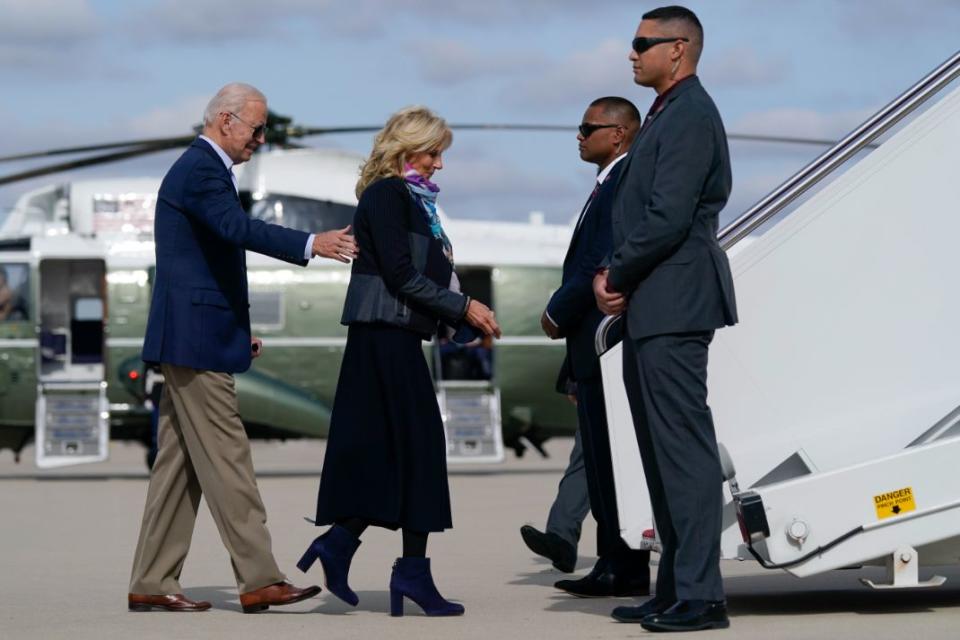 President Joe Biden and first lady Jill Biden walk to board Air Force One for a trip to Rome to attend the G-20 meeting, Thursday, Oct. 28, 2021, in Andrews Air Force Base, Md. - Credit: AP