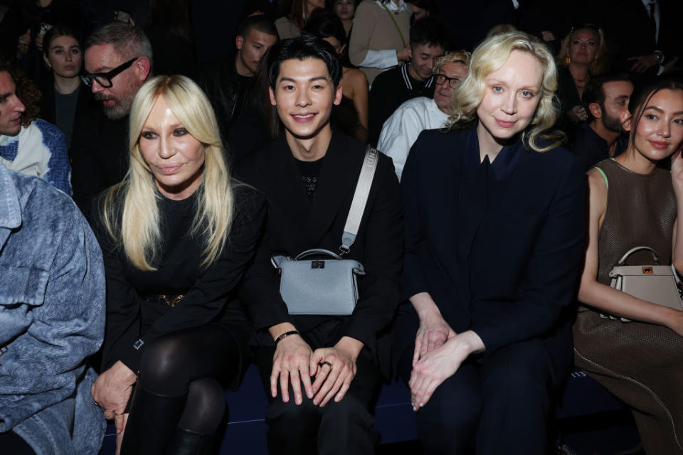 MILAN, ITALY - FEBRUARY 22: Donatella Versace, Greg Hsu and Gwendoline Christie attend the Fendi Fashion Show on February 22, 2023 in Milan, Italy. (Photo by Jacopo M. Raule/Getty Images for Fendi)