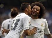 Football Soccer - Real Madrid v Rayo Vallecano - Spanish Liga BBVA - Santiago Bernabeu stadium, Madrid, Spain - 20/12/15 Real Madrid's Danilo (L) celebrates with team mate Marcelo after scoring the first goal REUTERS/Sergio Perez