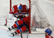 <p>Goalkeeper Pavel Francouz of Czech Republic in action against Patrick Thoresen of Norway at he 2017 IIHF World Championship in Paris, France on May 11, 2017. (Photo: Grigory Dukor/Reuters) </p>