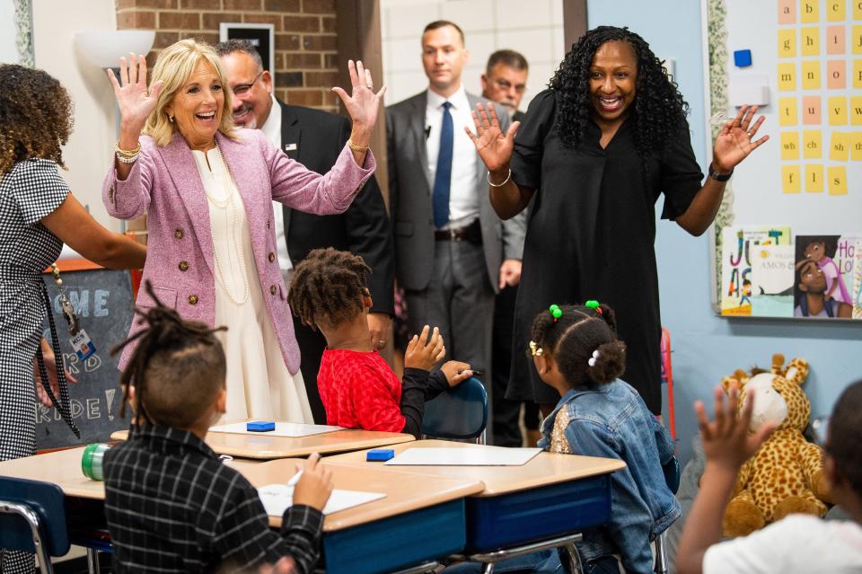 First lady Jill Biden and Principal Robin Curry greet third grade students at Sarah Moore Greene Magnet Academy in Knoxville on Monday. Education Secretary Miguel Cardona and the first lady are on a national tour of education.