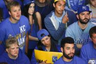 Kansas City Royals fans react as they watch the broadcast of baseball's World Series Game 7 between the San Francisco Giants and the Kansas City Royals, at The Kansas City Power & Light District in Kansas City, Missouri, October 29, 2014. REUTERS/Sait Serkan Gurbuz (UNITED STATES - Tags: SPORT BASEBALL)