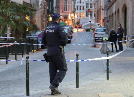 Police keep watch outside the police headquarters after a knife attack on a police officer, according to local media reports, in Brussels, Belgium November 20, 2018. REUTERS/Yves Herman