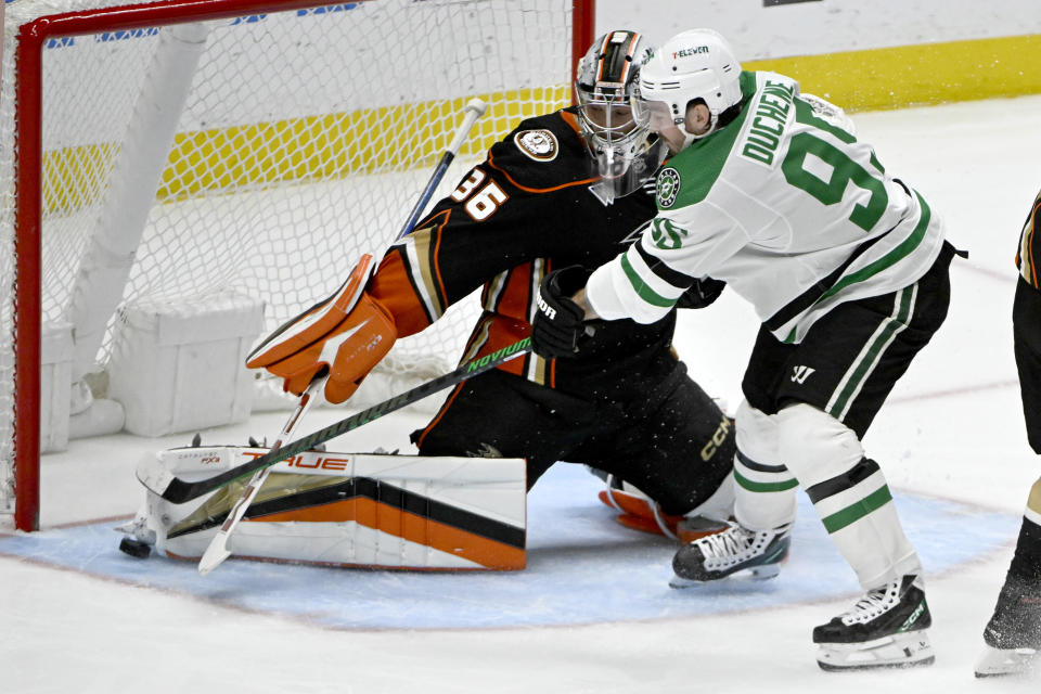 Anaheim Ducks goaltender John Gibson (36) stops a shot by Dallas Stars center Matt Duchene (95) during the third period of an NHL hockey game in Anaheim, Calif., Friday, March 8, 2024. (AP Photo/Alex Gallardo)