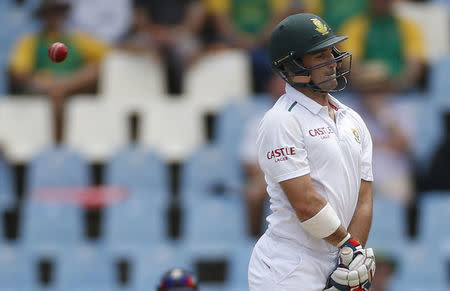 South Africa's Dean Elgar ducks a delivery during the fourth cricket test match against England at Centurion, South Africa, January 22, 2016. REUTERS/Siphiwe Sibeko