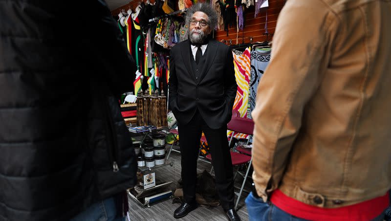 Presidential candidate Cornel West talks with a small group of supporters while at Twisted Roots in Salt Lake City on Monday, Nov. 20, 2023.