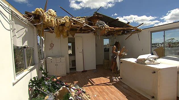 The roof at this Woolloongabba apartment block was ripped off during the storm. Source: 7News