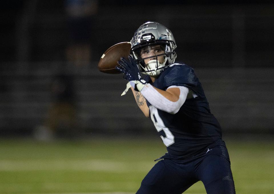 Reitz’s Roland Vera Jr. (9) passes the ball as the Reitz Panthers play the Vincennes Lincoln Alices at the Reitz Bowl in Evansville, Ind., Friday, Aug. 25, 2023.