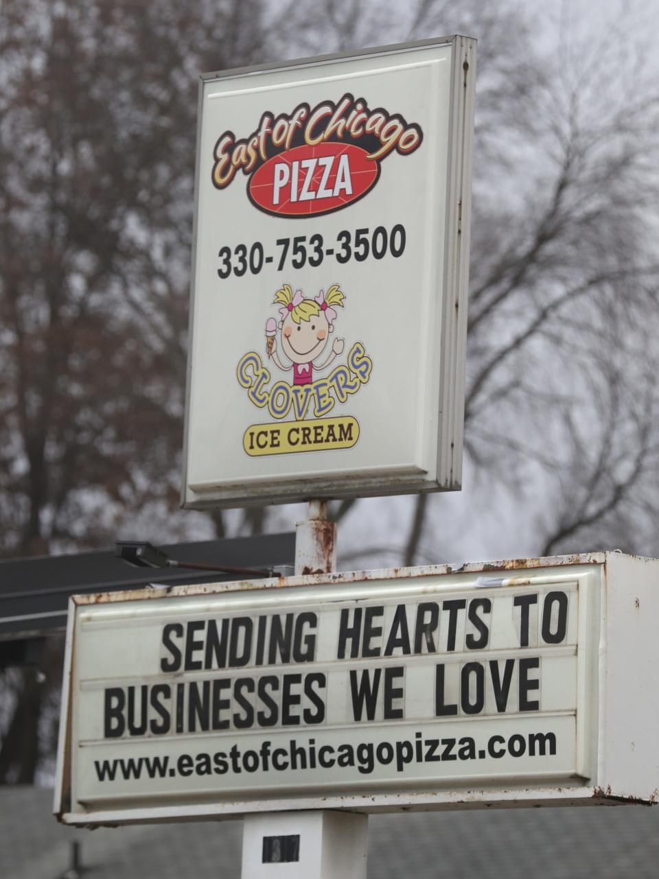 Owner Jeremy Clemetson's East of Chicago Pizza on Shannon Avenue is one of the instigators of Barberton's sign wars.