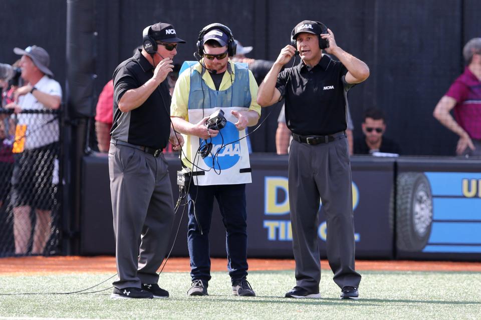 Jun 11, 2022; Hattiesburg, MS, USA; Umpires get a ruling on a deep fly ball by Southern Miss outfielder Reece Ewing (38) in the fifth inning against the Ole Miss during Game 1 of a NCAA Super Regional game at Pete Taylor Park. Ole Miss won, 10-0. Mandatory Credit: Chuck Cook-USA TODAY Sports