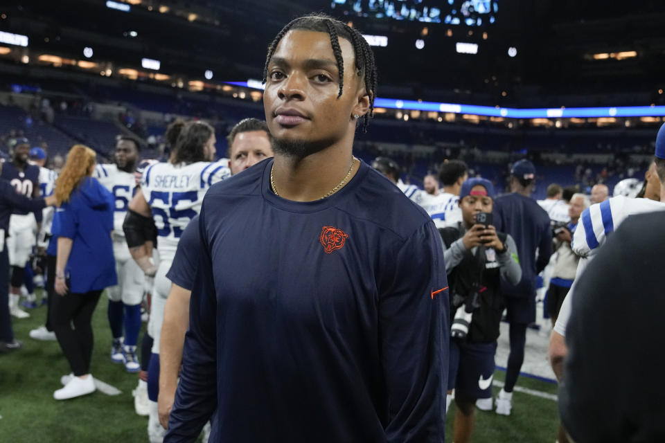 Chicago Bears quarterback Justin Fields leaves the field after the team's NFL preseason football game against the Indianapolis Colts in Indianapolis, Saturday, Aug. 19, 2023. The Colts won 24-17. (AP Photo/Michael Conroy)