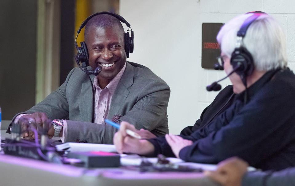 Former McKinley and Ohio State basketball star Ron Stokes (left) joins Scott Davis for the call on the McKinley-GlenOak game, Friday, Dec. 9, 2022, at Memorial Field House.