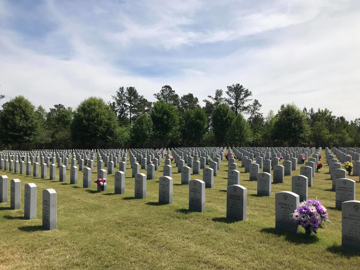 Rows of identical headstones stand in parallel lines at the Georgia Veteran Cemetery in Milledgeville.