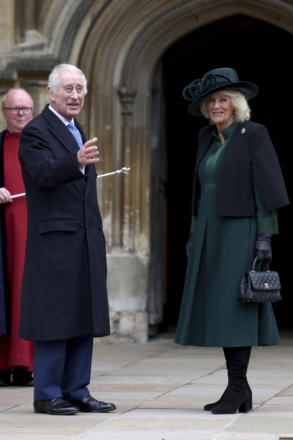 Britain's King Charles III, left, and Queen Camilla arrive to attend the Easter Matins Service at St. George's Chapel, Windsor Castle, England, Sunday, March 31, 2024. (Hollie Adams/Pool Photo via AP)