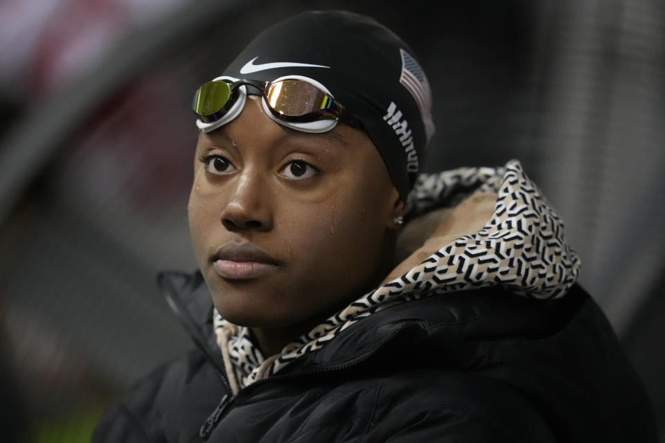 Simone Manuel prepares to compete at the Pro Swim Series event Thursday, Jan. 11, 2024, in Knoxville, Tenn. Manuel was the first Black female swimmer to capture an Olympic gold medal. Now she's coming back from a debilitating case of overtraining syndrome, her body breaking down in the leadup to the 2021 Tokyo Games. (AP Photo/George Walker IV)