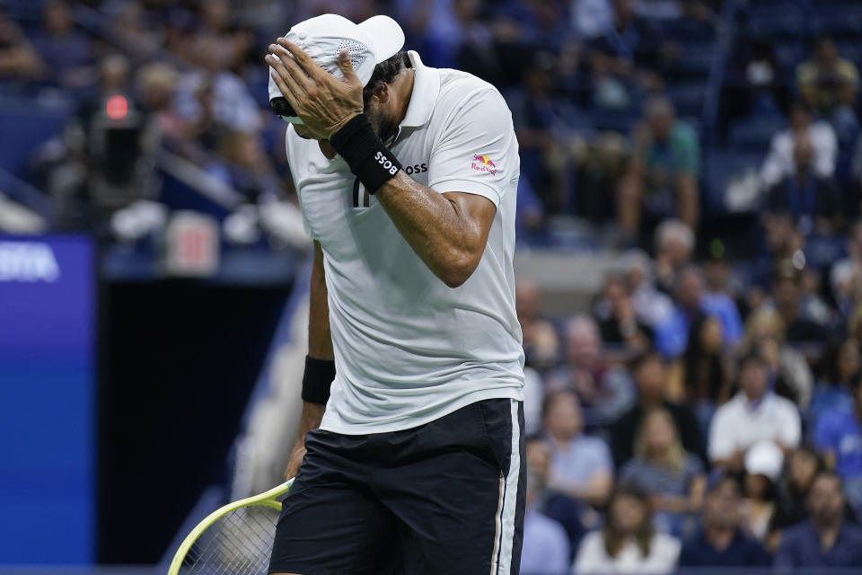 Matteo Berrettini, of Italy, reacts after losing a point to Casper Ruud, of Norway, during the quarterfinals of the U.S. Open tennis championships, Tuesday, Sept. 6, 2022, in New York. (AP Photo/Seth Wenig)