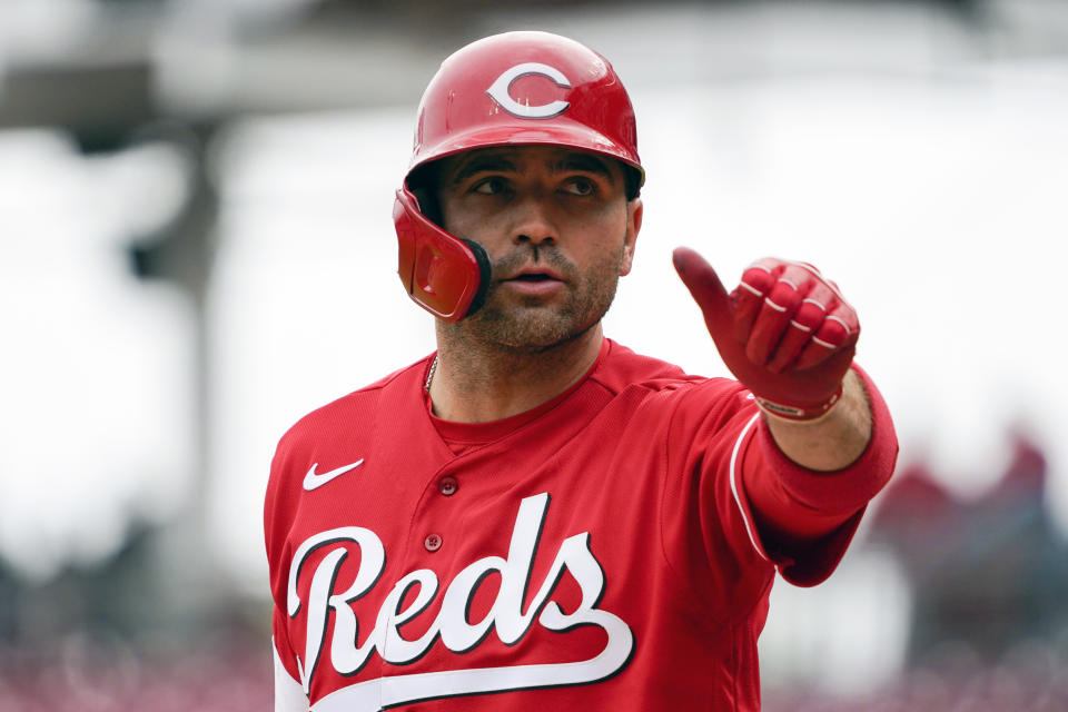 Cincinnati Reds' Joey Votto gestures to the umpire during at at-bat in the sixth inning of a baseball game against the San Diego Padres, Thursday, April 28, 2022, in Cincinnati. (AP Photo/Jeff Dean)