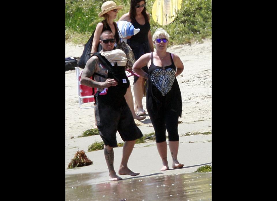 Pink and husband Carey Hart enjoy a beautiful beach day in Malibu, Calif., with new baby Willow on July 2, 2011.