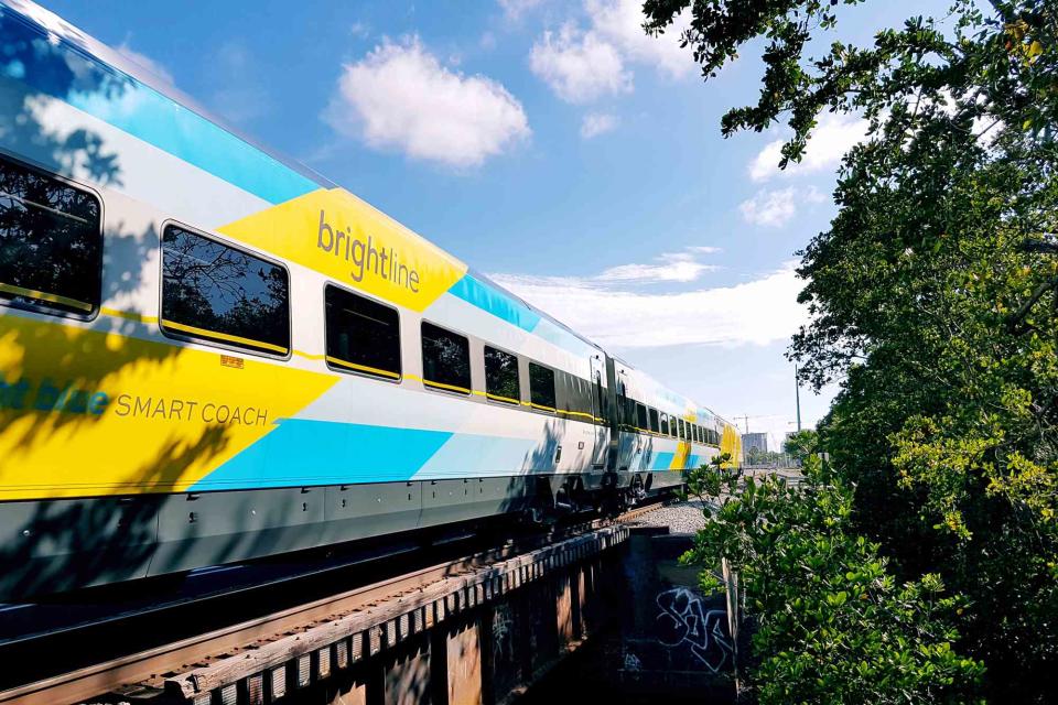 <p>Courtesy of Brightline</p> A Brightline high-speed train in Florida.