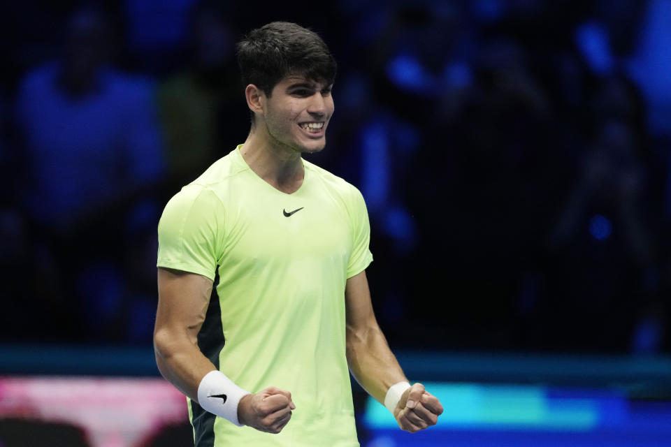 Spain's Carlos Alcaraz celebrates after winning the singles tennis match against Russia's Andrej Rublev, of the ATP World Tour Finals at the Pala Alpitour, in Turin, Italy, Wednesday, Nov. 15, 2023. (AP Photo/Antonio Calanni)