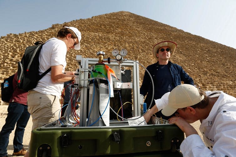 <span class="caption">Muon telescope setup in front of Khufus Pyramid.</span> <span class="attribution"><span class="source">contact@hip.institute</span></span>