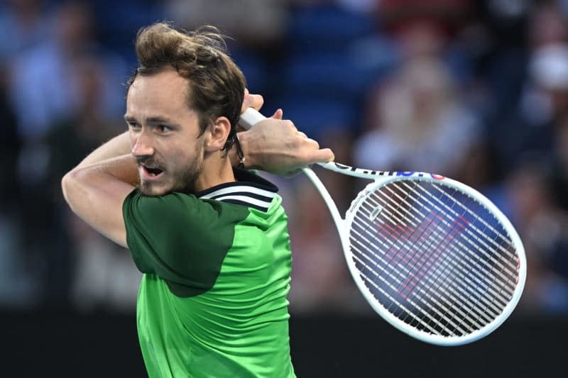 Russian tennis player Daniil Medvedev in action against Italy's Jannik Sinner during their Men’s Singles final tennis match of the 2024 Australian Open at Melbourne Park. Joel Carrett/AAP/dpa