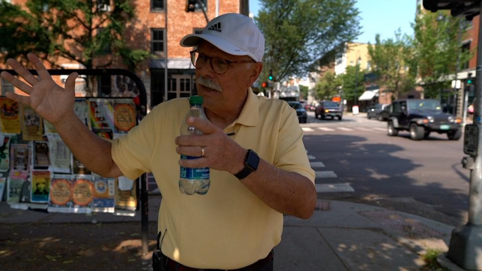 Citizen historian Bob Blanchard stands at the corner of College Street and South Winooski Avenue on June 30, 2023.