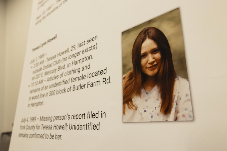 Teresa Lynn Howell's picture is displayed during a press conference in Suffolk, Virginia, on Jan. 8, 2024. Howell was last seen on E. Mercury Boulevard in Hampton, Virginia before unidentified remains were confirmed to be her in July of 1989. (Billy Schuerman/The Virginian-Pilot via AP)