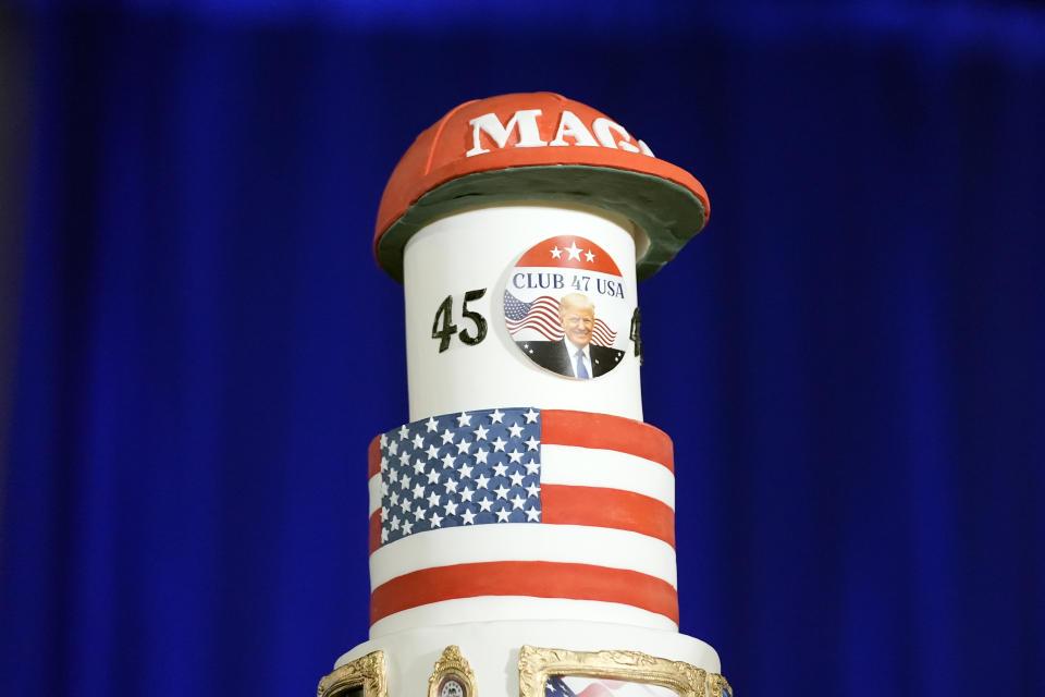 A birthday cake is seen on the stage before Republican presidential candidate former President Donald Trump speaks at his birthday celebration, hosted by Club 47, in West Palm Beach, Fla., Friday, June 14, 2024. (AP Photo/Gerald Herbert)