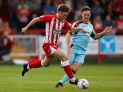 Football Soccer Britain - Accrington Stanley v Burnley - EFL Cup Second Round - Wham Stadium - 24/8/16 Accrington Stanley's Shay McCartan in action with Burnley's Aiden O'Neill Action Images via Reuters / Ed Sykes