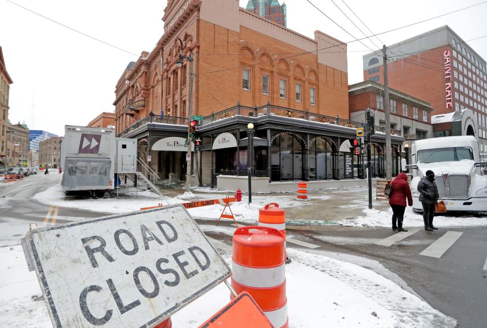 The street is closed at East Wells Street and North Water Street as equipment and TV trucks are parked outside the Pabst Theater in Milwaukee Sunday, Feb. 14, 2021. The theater is preparing for President Joe Biden to visit on Tuesday. Biden's visit is one of his first official stops since taking office. The "CNN Presidential Town Hall with Joe Biden" will air live Tuesday from the Pabst Theater at 8 p.m. CT.   - Photo by Mike De Sisti / Milwaukee Journal Sentinel