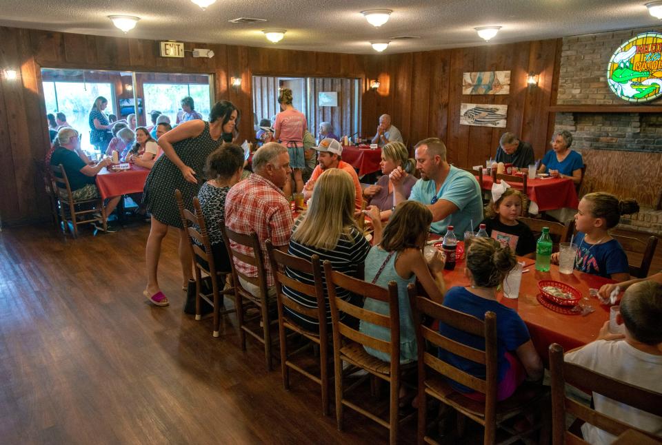 Customers dine on fine foods at  Gator's Seafood in Milton, Saturday, July 17, 2021.