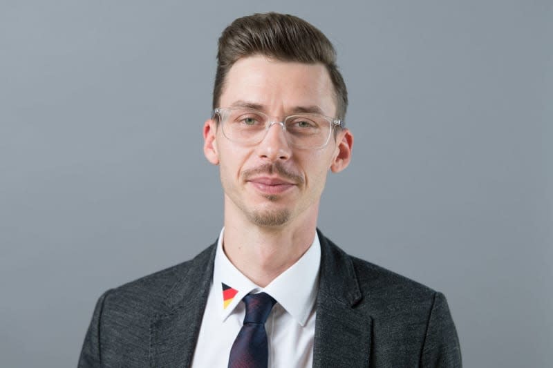 Mario Kumpf, a member of the Alternative for Germany (AfD) poses for a photo on the occasion of the constituent session of the Saxon state parliament. A far-right German politician was punched in the face while at a supermarket, adding to a rash of violent attacks on lawmakers of all parties. Sebastian Kahnert/dpa-Zentralbild/ZB