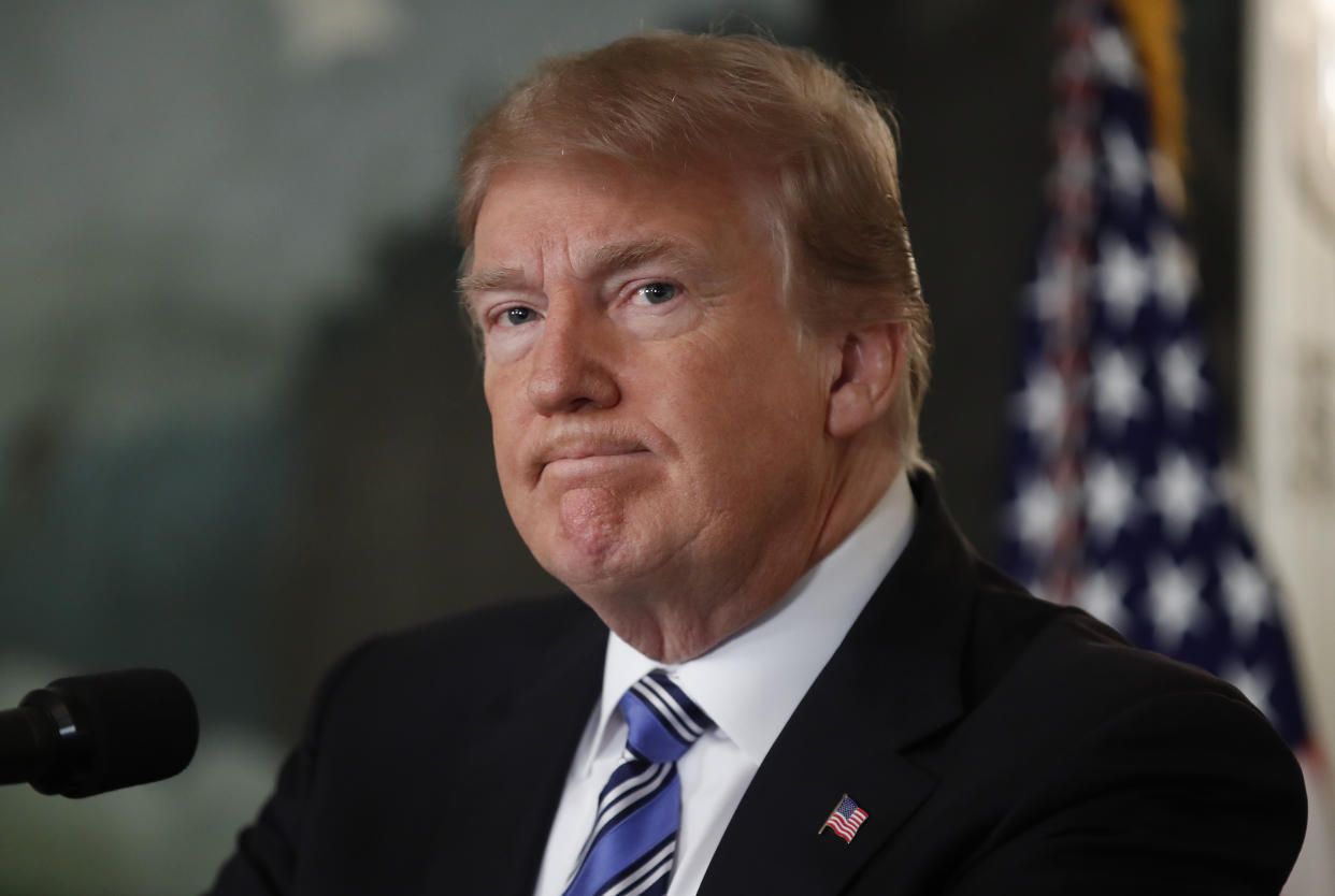 President Donald Trump pauses as he arrives to speak about the mass shooting at a South Florida High School from the White House, Feb. 15, 2018, in Washington. (Photo: Carolyn Kaster/AP)