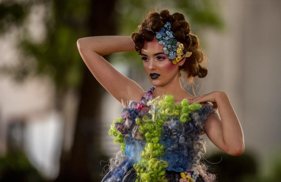 Model Willa Pettit posed for the camera during filming for 'KMAC Couture: Star Stuff' in downtown Louisville. Friday, July 10, 2020.