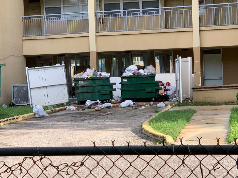 When the trash chute broke at the Maley Apartments in Daytona Beach, some residents started throwing their garbage bags off their balconies. Not all the bags make it into the dumpsters.