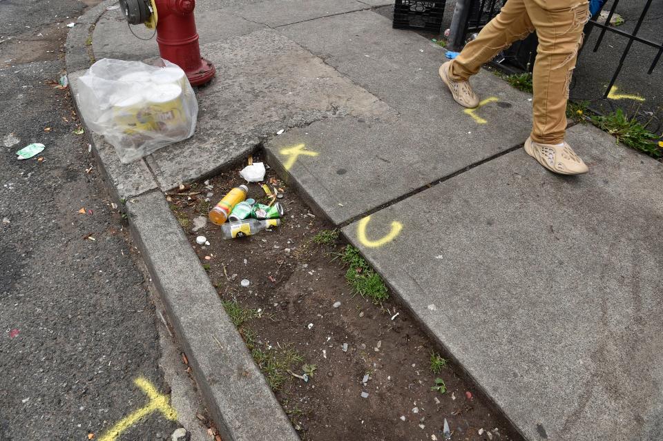 A teenage girl was shot and killed and several other people were wounded after gunfire on the corner of Essex and Madison Streets in Paterson just before 10:30 on Wednesday night May 11, 2022. On Thursday morning, torn down police take and spray painted letters could be seen in the area of the fatal shooting.