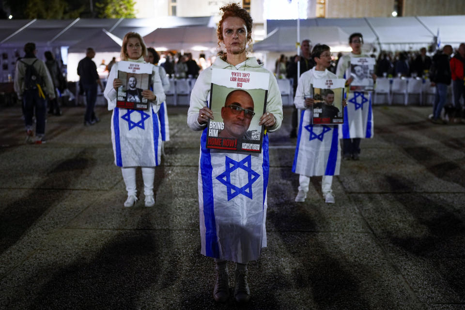 Friends and relatives of the Israeli hostages held in the Gaza Strip by the Hamas militant group attend a rally calling for their release in Tel Aviv, Israel, Saturday, Feb. 24, 2024. (AP Photo/Ohad Zwigenberg)