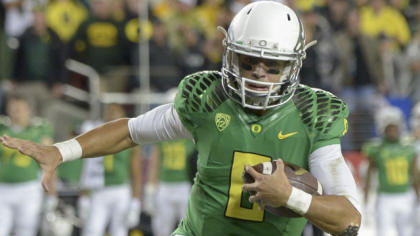 Will Marcus Mariota take home the Heisman Trophy? (Getty)