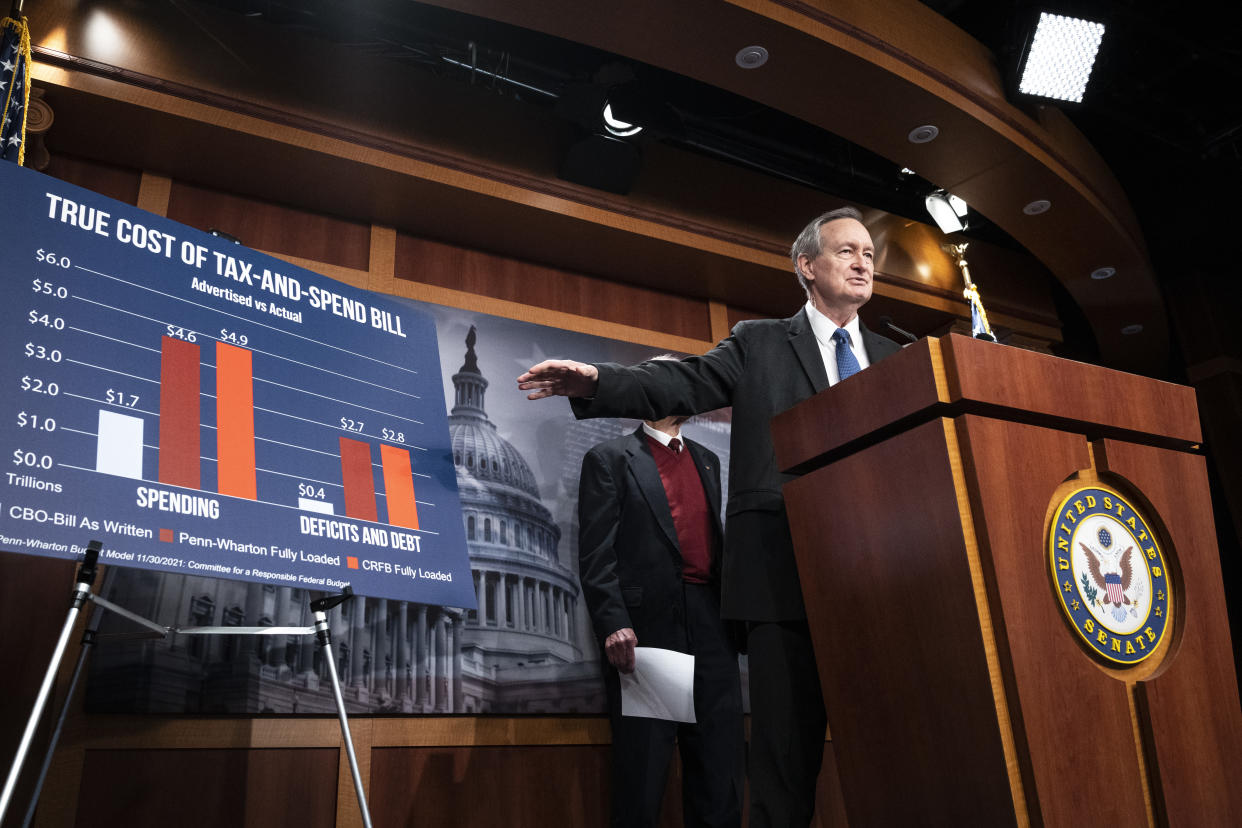 WASHINGTON, DC - DECEMBER 7: (L-R) Sen. Mike Crapo (R-ID) speaks about the Build Back Better Act that Democrats are trying to pass in the Senate during a news conference at the U.S. Capitol  December 7, 2021 in Washington, DC. In a letter to his Senate Democrat colleagues on Monday, Senate Majority Leader Chuck Schumer said he hopes to pass the Build Back Better legislation by Christmas. (Photo by Drew Angerer/Getty Images)