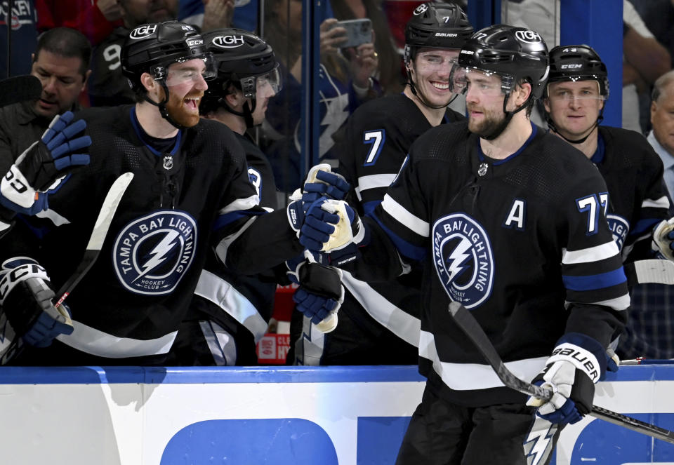 Tampa Bay Lightning defenseman Victor Hedman (77) celebrates his goal during the shootout of an NHL hockey game against Montreal Canadiens, Saturday, March 2, 2024, in Tampa, Fla. (AP Photo/Jason Behnken)