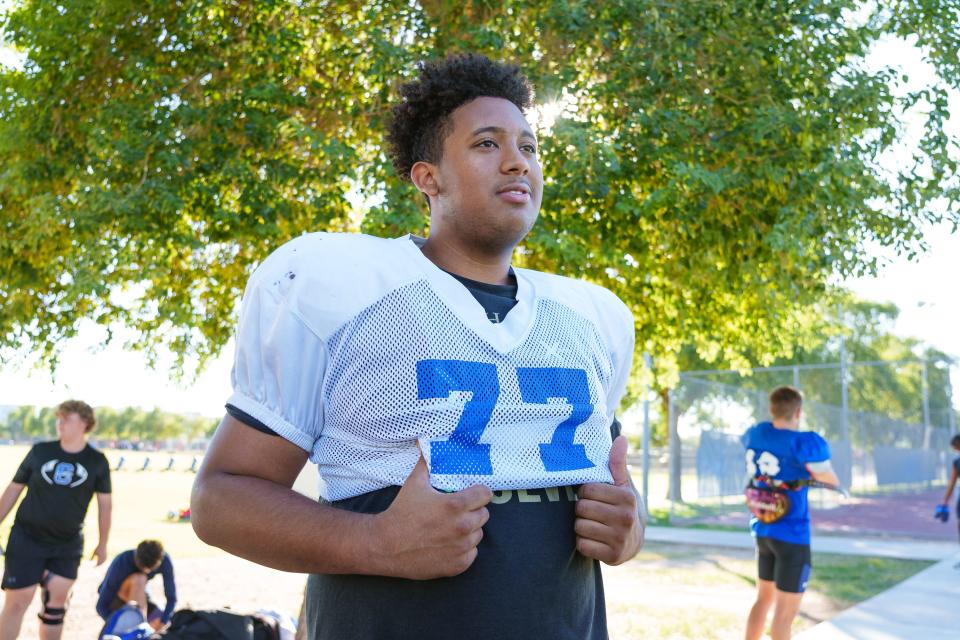 Offensive lineman, Zarius Wells speaks to a reporter before practice at Chandler High School on Oct. 24, 2022, in Chandler, AZ.