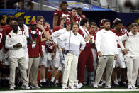 Alabama coach Nick Saban, center, watches from the sideline during the first half of the Cotton Bowl NCAA College Football Playoff semifinal game against Cincinnati, Friday, Dec. 31, 2021, in Arlington, Texas. (AP Photo/Michael Ainsworth)