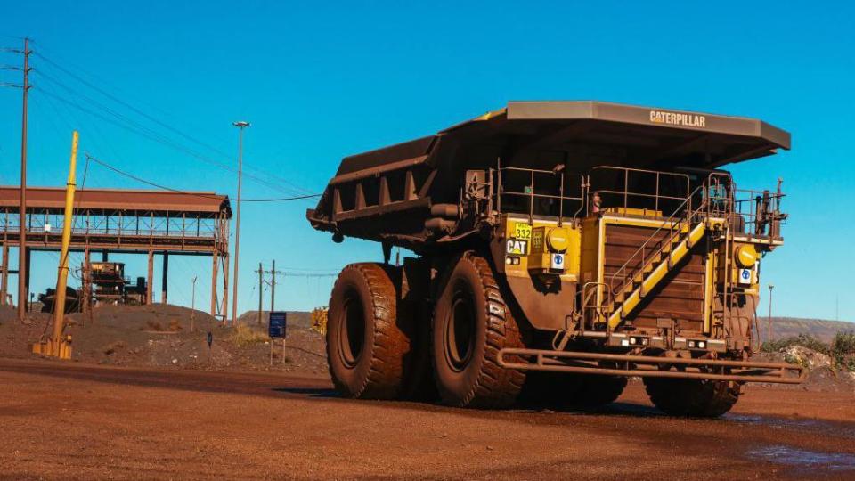 Caterpillar dumper truck at open-cast mine.