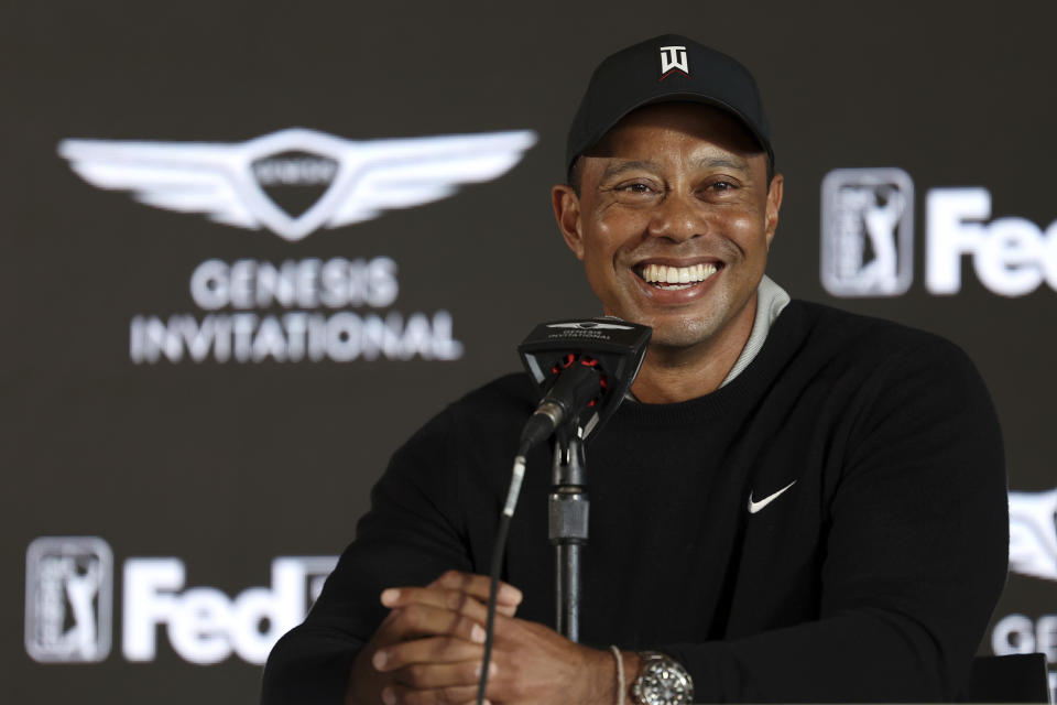 FILE - Tiger Woods speaks during a news conference for the Genesis Invitational golf tournament at Riviera Country Club, Wednesday, Feb. 16, 2022, in the Pacific Palisades area of Los Angeles. Woods is back at Riviera, this time with more on his plate than handing out the trophy in the Genesis Invitational. He returns to the PGA Tour for the first time since July. (AP Photo/Ryan Kang, File)