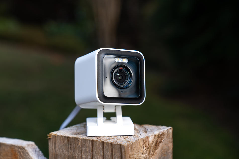 Wyze Cam V3 Pro on top of wooden post